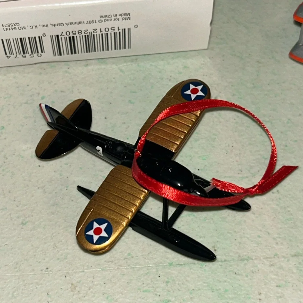 2 Hallmark Ornaments 1999 Sky's the Limit Airplane 1997 The Flight At Kitty Hawk